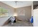 Bedroom featuring a ceiling fan, window and neutral walls at 1224 S Delaware Ave, Deland, FL 32720