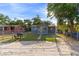 Charming single-story home with a fenced front yard and mature trees at 1224 S Delaware Ave, Deland, FL 32720