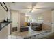 Cozy living area with tile flooring seamlessly connecting to the kitchen at 1224 S Delaware Ave, Deland, FL 32720