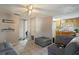 Open-concept living area featuring tile floors and easy access to the kitchen at 1224 S Delaware Ave, Deland, FL 32720