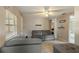 Comfortable living room with tile floors, neutral tones, and inviting seating at 1224 S Delaware Ave, Deland, FL 32720