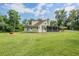 Charming two-story home features a screened porch, perfect for enjoying the outdoors at 1611 County Road 753S, Webster, FL 33597