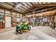 Interior shot of the large garage with work and storage space and a variety of equipment at 1611 County Road 753S, Webster, FL 33597