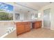 Bathroom with a soaking tub, double sinks, and an expansive mirror at 239 Beacon Pointe Dr, Ocoee, FL 34761