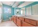 Bright bathroom features double sinks, a bathtub, and lots of natural light at 239 Beacon Pointe Dr, Ocoee, FL 34761