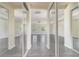 View through mirrored closet doors highlighting the spacious bedroom and natural light at 239 Beacon Pointe Dr, Ocoee, FL 34761