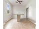 Bright dining room with an outside view and modern ceiling fan at 239 Beacon Pointe Dr, Ocoee, FL 34761