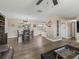 Open-concept dining area, featuring modern décor and seamless flow into the kitchen at 718 Cr 467, Lake Panasoffkee, FL 33538