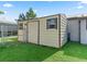 Exterior view of the backyard shed for extra storage space at 718 Cr 467, Lake Panasoffkee, FL 33538