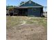 The rear exterior features a screened porch, providing a relaxing outdoor space at 2915 Winter Lake Rd, Lakeland, FL 33803