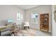 Home office featuring a modern desk, comfortable chair, shelving, and a window providing natural light at 5920 Bristle Oak St, Mount Dora, FL 32757