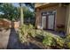 Cozy backyard patio featuring a charming hanging chair and outdoor grill, perfect for relaxing at 6300 Raleigh St # 102, Orlando, FL 32835