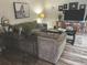 Comfortable living room featuring a cozy seating area and decorative wall art at 730 Barber Cir, Lakeland, FL 33803