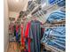 Functional walk-in closet with wire shelving, organized clothing racks, and plenty of storage for accessories at 14365 Evans Ranch Rd, Lakeland, FL 33809