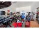 Spacious and cluttered garage filled with motorcycles, tools, and equipment, perfect for mechanics at 14365 Evans Ranch Rd, Lakeland, FL 33809