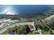 Aerial view of single-story home, located across from the lake at 1816 W Lake Parker Dr, Lakeland, FL 33805