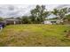 Vast backyard offering endless possibilities for landscaping, recreation, or future expansions at 1816 W Lake Parker Dr, Lakeland, FL 33805