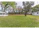 Sprawling backyard providing ample room for outdoor activities and potential landscaping projects at 1816 W Lake Parker Dr, Lakeland, FL 33805