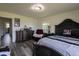 Spacious bedroom with traditional furnishings, and a comfortable sitting area at 1816 W Lake Parker Dr, Lakeland, FL 33805