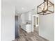 Stylish kitchen area features white cabinets, stainless appliances, and modern countertops and flooring at 1816 W Lake Parker Dr, Lakeland, FL 33805
