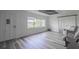 Bright and spacious living room with hardwood floors and a view of the lake at 1816 W Lake Parker Dr, Lakeland, FL 33805