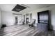 Well lit open plan living room with a sliding barn door at 1816 W Lake Parker Dr, Lakeland, FL 33805