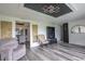 Bright living room with views into dining room and kitchen at 1816 W Lake Parker Dr, Lakeland, FL 33805