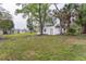 Picturesque yard with mature trees providing shade and enhancing the property's natural beauty at 1816 W Lake Parker Dr, Lakeland, FL 33805