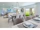 View of dining and Gathering room, demonstrating the floorplan and included outdoor space at 2076 Babbling Brook Blvd, Auburndale, FL 33823