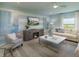Stylish living room with modern decor and an open-concept layout for entertaining at 2076 Babbling Brook Blvd, Auburndale, FL 33823