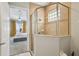 View of the main bedroom from the bathroom, showcasing a stylish tiled shower at 7523 Excitement Dr, Kissimmee, FL 34747