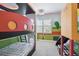 bedroom featuring a bunk bed and cartoon murals at 7523 Excitement Dr, Kissimmee, FL 34747