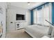 This Star Wars themed bedroom features a Star Wars themed wall mural and themed decor at 7523 Excitement Dr, Kissimmee, FL 34747
