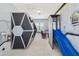 Star Wars themed bedroom featuring unique bunk beds with a slide and wall murals at 7523 Excitement Dr, Kissimmee, FL 34747