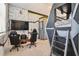 This Star Wars themed bedroom features a gaming area and unique bunk beds with a slide and wall murals at 7523 Excitement Dr, Kissimmee, FL 34747
