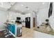 Modern kitchen with stainless appliances, granite counters, tile floors and eat-in bar at 7523 Excitement Dr, Kissimmee, FL 34747