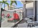 Patio featuring outdoor seating and lush landscaping at 7523 Excitement Dr, Kissimmee, FL 34747