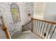 Unique staircase featuring castle-themed decor and stained-glass-style art window at 7523 Excitement Dr, Kissimmee, FL 34747