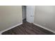 Comfortable bedroom features updated flooring and a neutral color palette for relaxation and personalization at 5222 Montague Pl, Orlando, FL 32808