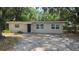 Charming single-story home featuring a well-maintained exterior and a welcoming entrance, plus a driveway at 5222 Montague Pl, Orlando, FL 32808