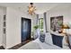Bright bedroom with modern star lighting, dark closet door, and stylish decor at 740 Oak Shadows Rd, Kissimmee, FL 34747