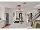 Spacious kitchen with a large island, stainless steel appliances, and open access to the living area at 740 Oak Shadows Rd, Kissimmee, FL 34747