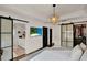 Bedroom with barn door access to a walk-in closet and ensuite bathroom at 740 Oak Shadows Rd, Kissimmee, FL 34747