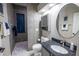 Updated bathroom featuring a tiled walk-in shower and modern vanity at 790 Country Charm Cir, Oviedo, FL 32765