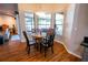 Breakfast nook featuring a round table, wood chairs, and large windows with backyard views at 790 Country Charm Cir, Oviedo, FL 32765