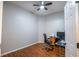 Office space featuring hardwood floors and a ceiling fan at 790 Country Charm Cir, Oviedo, FL 32765