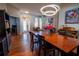 Open floor plan featuring a living room, dining room, and hardwood floors at 790 Country Charm Cir, Oviedo, FL 32765