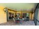 Covered and screened patio has brick pavers and seating arrangements, perfect for outdoor relaxation at 790 Country Charm Cir, Oviedo, FL 32765