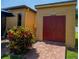 Dog house structure on the property with red double doors at 790 Country Charm Cir, Oviedo, FL 32765