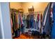Organized walk-in closet with hardwood floors and plenty of storage space at 790 Country Charm Cir, Oviedo, FL 32765